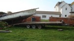A yacht which had been sitting in a field for years , being winched up onto the trailer ,in its own cradle,using years of experience ! - click to enlarge