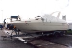 A Wellcraft powerboat  which has arrived in Southampton Port to be towed to Gloucester. - click to enlarge