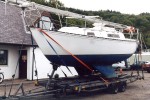 A twin bilge keel yacht being towed frim Inverkip Marina to Dover